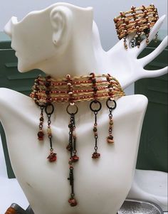 This is an exquisite design, red jasper raw nuggets, patina, raw copper beads, handcrafted with genuine horsehair. Lots of style, and beauty. You can create your own design using your own horse's hair! Keepsake Jewelry. The design shown in pictures is the exact piece you will receive. 15 inch Choker Equestrian Jewelry55 Send me a message if you would like your own keepsake! Join us on Pier 60, Clearwater Beach Nightly Festival. Like our page on Facebook for coupon codes on your purchase. Listing is for the choker only. All designs are copyright protected. Bohemian Hand-wrapped Jasper Jewelry, Bohemian Brown Copper Wire Jewelry, Earthy Copper Jewelry For Festivals, Earthy Hand Forged Adjustable Jewelry, Hand Wrapped Brown Dangle Jewelry, Rustic Hand Forged Brown Jewelry, Rustic Brown Hand Forged Jewelry, Handmade Adjustable Rust Jewelry, Rustic Copper Jewelry For Festivals