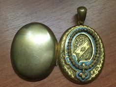 "Lovely antique etched and applied decoration Victorian locket with turquoise painted trim around the raised piece. Locket measures a hair over 2\" in Length(including loop) X 1 1/4\" in Width X almost 1/2\" thick. Hard to get exact thickness, but as you can see in photos the locket is very thick. The detail on this peice is really exquisite, that is what makes it soooo special! Made around the 1860's and in excellent antique condition for it's age. The gold filled is worn on back from wear, fro Painted Trim, Locket Gold, Large Locket, Enamel Locket, Victorian Locket, Rhinestone Jewelry Set, Picture Locket, Turquoise Painting, Antique Locket