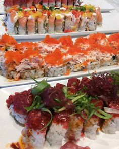 three different types of sushi displayed on white plates