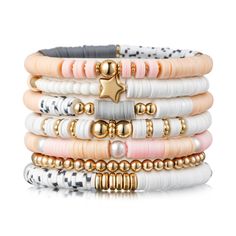 PRICES MAY VARY. Pink Stackable Bracelets: This surfer heishi clay bead bracelets set includes 7 unique bracelets, featuring 6 distinct compositions of gold-plated beads, polymer clay beads in shades of pink, gray, and white. And an additional bracelet composed of gold-plated round beads. With a dominant pink hue, these bracelets add a pop of color and style to your everyday ensemble. Great Material: Our friendship bracelets are crafted with care, strung by hand with pearl beads, 14K gold-plated Mommy And Me Clay Bead Bracelets, White And Gold Clay Bead Bracelet, Clay Bead Bracelet Aesthetic, Ideas For Clay Bead Bracelets, Pink Clay Bead Bracelet Ideas, Clay Bead Brackets, Clay Beads Ideas, Clay Bracelet Ideas, Flat Bead Bracelet