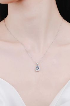 Square Moissanite Pendant Chain Necklace Elevate your elegance with the Square Moissanite Pendant Chain Necklace, a timeless piece that epitomizes sophistication and brilliance. This exquisite necklace is designed to capture attention and leave a lasting impression. Key Features: Brilliant Moissanite: Featuring a stunning 1-carat square moissanite gemstone, this necklace sparkles with unmatched brilliance, ensuring you stand out in any crowd. Premium Material: Crafted from 925 sterling silver, r Silver Chain Pendant Design, Silver Pendant Design, Silver Chain With Pendant, Sky Jewelry, Airport Fit, Ghost Mannequin, Stone Properties, Emerald Necklace Pendant, Moissanite Pendant