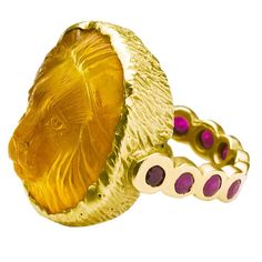 Hand carved by renowned German carver is this regal citrine lion’s head ring set in 18 karat brushed gold with 1.3 cts ruby eternity band. 20×22 mm stone size. Ring size 8 Myrcella Baratheon, Ruby Eternity Band, Equine Jewelry, Cats Eye Ring, Lion Jewelry, Animal Themes, Bee Ring, Jewelry Girl, Head Ring