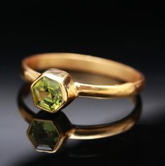 AAA Natural Green Peridot Hexagon Ring, 14K Solid Gold Jewelry, Stacking Ring, Simple Dainty Ring, Boho Jewelry, Gift For Her, Birthday Gift Specifications :- * Material            :        Gold, Gemstone * Stone Name    :        Natural Peridot * Stone Size       :        5X5 mm * Ring Weight     :       1.40 Gm. Approx *All of our jewelry are hand made and made to order. *We use only 10K or 14k real gold. "Not Plated or Filled" Shipping Handling Time :     We Take no handling time, We ship to Yellow Gold Octagonal Rings For Gifts, Octagon Yellow Gold Rings For Gift, Yellow Gold Octagon Rings For Gift, Gold Octagon Rings For May Birthstone, Gold Faceted Emerald Ring For Wedding, Gold Peridot Stackable Rings As Gift, Hallmarked Octagon Rings For Gifts, Gold Faceted Birthstone Ring For Wedding, Gold Stackable Peridot Rings As A Gift