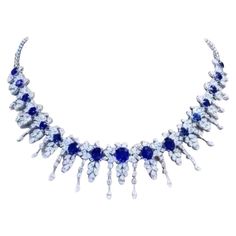 A very piece of art for this necklace in contemporary and romantic style , by Italian designer. So glamour and unique! Necklace is in 18k gold and come with 17 pieces of exceptional royal blue Ceylon sapphires, in oval cut, fine quality, of 24,30 carats, each sapphire is about of 3,50 carats, and 231 pieces of natural diamonds, drop and round brilliant cut of 18,78 carats, F color and VS clarity . Handcrafted by artisan goldsmith. Excellent manufacture and quality. Complete with gemological report. Whosale price. Note: on my shipment, customers not pay taxes and duty. 18k Gold Necklace, Ceylon Sapphire, Expensive Jewelry, Sapphire Necklace, Romantic Style, Stunning Jewellery, Fantasy Jewelry, Sapphire Diamond, Royal Blue