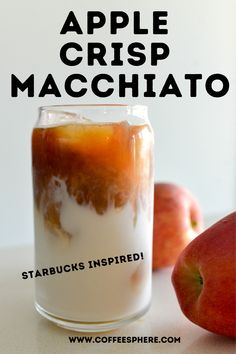 an apple crispy macchiato in a glass next to some apples