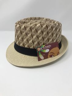 Looking for a dapper look? Hat is the perfect addition to your spring and summer wardrobe. With the lightweight and cool material of this hat, you'll be sure to stay cool and stylish all year long. This listing is for one hat only. measurement - small/med Guaranteed fast shipping! Casual Lightweight Straw Hats, Trendy Short Brim Hat, Casual Straw Sun Hat With Short Brim, Casual Sun Hat With Short Brim For Day Out, Casual Lightweight Sun Hat With Short Brim, Casual Lightweight Hat, One Size Fits Most, Casual Adjustable Hat For Day Out, Casual Lightweight Fedora, Casual Fedora For Summer