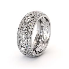 This white gold wedding band is the perfect women wedding band or gift so it is eye catching and emphasizes the adornment perfectly and this diamond wedding band has a very feminine appearance. Drawing on the past is a great way to locate a unique and distinctive style. Many wedding band designers take inspiration from history and are influenced by the styles and styles of the 20th century. Shape, color, shine, line -- when it comes to wedding bands, there are particular elements that catch your White Gold Diamond Ring With Decorative Band For Promise, Diamond Wedding Ring With Decorative Band, White Gold Promise Ring With Decorative Band, Diamond Wedding Band With Decorative Design, Anniversary Diamond Ring In White Gold With Decorative Band, White Gold Wedding Band With Decorative Details For Promise, White Gold Decorative Eternity Band For Promise Ring, White Gold Decorative Eternity Band For Wedding, Decorative Diamond Band With Round Cut