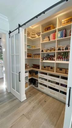 an instagram photo of a pantry with doors open