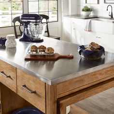 Gorgeous and reclaimed look carbonized pine makes up this smart iNSPIRE Q kitchen island by iNSPIRE Q Classic. Slide-out the leaf extension from the hidden pocket to create additional surface space then push it back in to open up your room. Select your choice of easy-to-clean stainless steel, classic reclaimed look carbonized pine, or industrial concrete veneer for the tabletop of your new, space-conscious kitchen island. Features: Overall dimensions when fully extended: 99.5 in. width x 36 in. Stainless Steel Island Kitchen, Steel Island Kitchen, Extendable Kitchen Island, Stainless Steel Kitchen Island, Stainless Steel Island, Rolling Kitchen Island, Kitchen Island With Seating, Push It, Stainless Steel Cleaning