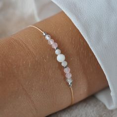 ✦ Moonstone Bracelet with  rose quartz, zircon, hematite, Delicate adjustable bracelet, Gemstone Minimalist Bracelet,  Everyday Bracelet ✦ This bracelet made of beige jewelry string and natural stones with a size of 2mm to 4mm. ✔ moonstone ✔ rose quartz ✔ zircon ✔ silver hematite ✦ The bracelet is adjustable thanks to the macrame weaving technique, it is comfortable to put on.  The nylon string makes the bracelet very durable ✦ Your bracelet will be packed in a hand made envelope with a brand logo, making it perfect for gifting  ✦ If you want to give jewelry to a loved one and leave a message for them, give me its content in the message when buying  ✦ Perfect bracelet: ✦ * for myself :) * as a gift for mom/sister/friend * as a thank you to the bridesmaid * as a gift for girlfriend/fiancée/ Minimalist Adjustable Crystal Bracelet With Gemstone, Adjustable Minimalist Crystal Bracelet, Adjustable White Rose Quartz Jewelry, Delicate Adjustable Crystal Bracelet With Gemstone, Delicate Adjustable Crystal Gemstone Bracelet, Adjustable Rose Gold Beaded Bracelets With Natural Stones, Delicate Adjustable Bracelets With Natural Stones, Adjustable Silver Bracelet With Rose Quartz, Delicate Adjustable Gemstone Beaded Bracelets