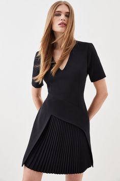 This Is A Limited Edition Piece, Created As One Of Just 150 Styles. Modern Fitted A-line Mini Dress, V-neck Pleated Waist Dress For Work, Structured Mini Dress For Work, Classic V-neck Mini Dress For Semi-formal Occasions, Formal V-neck Pleated Dress With Pleated Hem, Chic A-line Mini Dress With Box Pleat, Elegant Structured Mini Dress, Fitted A-line Mini Dress For Office, Flattering Formal Mini Dress