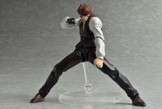 the action figure is posed on top of a clear stand with one arm extended and his head tilted