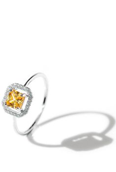 .925 Sterling Silver Ring w/Yellow Crystal | Honeysuckle by Oomiay – Oomiay Jewelry Yellow Halo Ring Jewelry, Dazzling Yellow Rings With Halo Setting, Yellow Diamond Halo Jewelry, Yellow Diamond Ring With Halo, Yellow Diamond Ring With Halo Setting For Promise, Elegant Yellow Halo Jewelry, Yellow Halo Rings As A Gift, Fine Jewelry Yellow Diamond Ring With Halo Design, Elegant Citrine Diamond Ring With Halo Setting