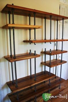 the shelves are made out of wood and metal