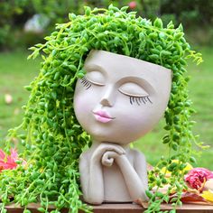 PRICES MAY VARY. ❤ 【Too Cute to Make You Smile】She is unique and fun, It will make us smile every time we see her. ❤ 【Cute Face Planter with Drinage Hole】Bottom hole is definitely needed for living plants. It will make well draining to prevent the roots rot. ❤ 【Small & Lightweight 】 Resin material makes the planter solid for outdoor plants, and it's also small size(6.6 inches tall, 2-3.5 inches oval openning diameter, ) and lightweight for indoor plants. ❤ 【Great Gift Idea】 You will get sooo man Pottery Plant Pots, Face Plant Pot, Flower Pot Design, Garden Vases, Face Vase, Face Planters, Succulents Decor, Head Planters, Garden Pottery