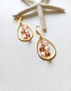 Beautiful pair of dainty earrings made with cultured  glass teardrops. The teardrops hang from gold filled chains on gold plated ear wires. Arrives in a jewelry box, perfect for gifting. Colours may vary slightly depending on the setting of your monitor. Please choose teardrops colours from drop down menu. If you need a bigger quantity or any customized jewellery for your very special occasion (birthdays, weddings, bridal showers or any other event), please send me a message and I'll be glad to Czech Glass Teardrop Earrings With Ear Wire, Glass Teardrop Jewelry With Matching Earrings, Nickel-free Czech Glass Teardrop Earrings, Nickel-free Teardrop Glass Earrings, Teardrop Glass Earrings With Ear Wire, Glass Teardrop Earrings With Ear Wire, Czech Glass Teardrop Earrings Gift, Teardrop Wire Wrapped Glass Earrings, Wire Wrapped Teardrop Glass Earrings