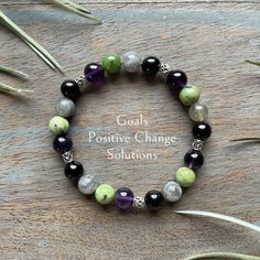 Amethyst, black obsidian, chrysoprase and labradorite gemstones for Positive change and growth - Paravati Goddess Bracelet.   Paravati is the goddess of mountains. She represents breaking your goals into baby steps; taking one step at a time. Call upon Paravati for help to find a solution to your seeming problem. She can help you stay true to your path. I created this bracelet with 8 mm amethyst, black obsidian, chrysoprase and labradorite.  All these stones work together to bring positive chang Spiritual Obsidian Crystal Bracelet, Bohemian Black Crystal Healing Bracelet, Spiritual Black Amethyst Beaded Bracelets, Black Amethyst Beaded Bracelets Spiritual, Spiritual Obsidian Bracelets For Healing, Black Amethyst Gemstone Bracelets, Black Amethyst Gemstone Bracelet, Obsidian Beaded Bracelets With Natural Stones For Healing, Black Jade Bracelets Gift