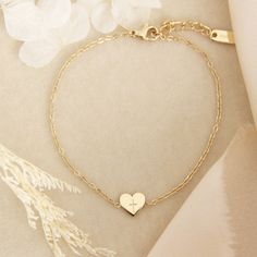 Tiny Heart Cross Bracelet * This listing is for one (1) bracelet * Lengths: 6.5" + 1.5" extender. Lengthens up to 8" * Measurements: 7mm charm * Chain: Delicate simple chain * Finish: 18K gold over surgical or polished surgical steel. Tarnish resistant and waterproof. * Nickel Free and Lead Free. Hypoallergenic. * All our jewelry is packaged in signature LoveStory Collection by MAIVE gift boxes. If you would like multiple items from your order packaged separately please let us know! Please message us if you have any questions about our products, styling, or recommendations. We are happy to help! © 2024 LoveStory Collection by MAIVE Delicate Adjustable Bracelets For Valentine's Day, Delicate Adjustable Bracelet For Valentine's Day, Delicate Heart-shaped Bracelets With Adjustable Chain, Dainty Heart Charm Bracelet For Wedding, Dainty Heart Bracelet With Adjustable Chain For Wedding, Delicate Heart Bracelet With Heart Charm For Mother's Day, Delicate Adjustable Heart Bracelet For Anniversary, Adjustable Heart Charm Chain Bracelet For Wedding, Adjustable Delicate Heart Charm Bracelet