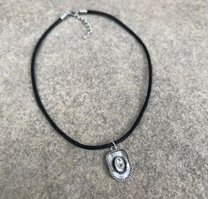 Want to add a little Yeehaw to your outfit? Look no further than this cute choker! Just add some cowboy boots and you're good to go. This is a black waxed cotton cord choker necklace featuring a small silver tone cowboy hat charm. Please choose your desired choker length at checkout! ♥ More chokers here: https://www.etsy.com/shop/BohoXoXo?ref=hdr_shop_menu&section_id=18907400 ☼ Instagram: @BohoXoXox ☼ Facebook: www.facebook.com/SuDanDesign ☼ Vintage: www.etsy.com/shop/2ndPerception Western Black Jewelry For Rodeo, Black Western Style Jewelry For Rodeo, Black Concho Jewelry For Western-themed Events, Black Concho Jewelry For Rodeo, Skull Bracelet Men, Cowboy Hut, Cowgirl Necklaces, Country Festival, Mens Bracelet Black