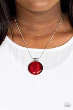 Attached to a decorative silver fitting, a dramatically oversized red cat's eye stone pendant glides along a rounded silver snake chain below the collar for a powerful pop of color. Features an adjustable clasp closure.

 Sold as one individual necklace. Includes one pair of matching earrings. Aura Red, Squirrel Jewelry, My Aura, Aura Necklace, Nickel Free Jewelry, Cats Eye Stone, Red Necklace, Red Cat, Silver Snake Chain