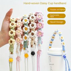 the hand - woven daisy cup handle is made from crocheted cottons and beads