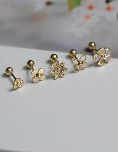 custom order 4-5 weeks. we do not take rush orders.  Come with jewelry bag  1: diameter 4mm  2: 5.7mm  3 : 6.5mm  4 : 6.34mm  5: 6.5mm  earrings are very tiny, please check measurement before purchase  each order is for one single earring. if you need a pair please select qty 2 at checkout. thanks  Any jewelry for pierced ears can not be returned, for hygiene reasons Material: 14k solid gold  Gold Info:  24K gold is 100% pure 18K contains 75% gold and 25% alloyed metals 14K is 58% gold and 42% a Real Gold Earrings Designs, Cheap Gold Chandbalis, Small Earrings Design, Cute Gold Flower-shaped Earrings, Cute Gold Flower Charm Earrings, Cute Gold Flower-shaped Jewelry, Kids Jewelry Gold, Ear Rings Gold, Earrings For Kids