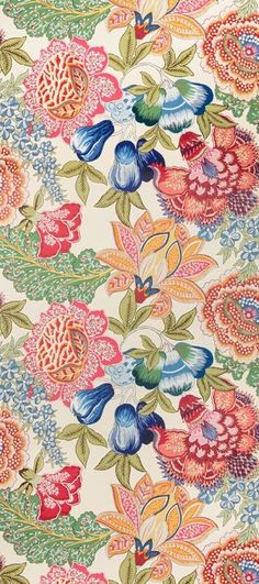 an image of a colorful flower pattern on white fabric with blue, red and green flowers