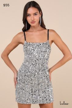 Grab your highest heels and get ready to celebrate the night in the Lulus Stunning Spotlight Silver Multi Textured Sequin Mini Dress! This gorgeous little dress boasts a unique fabrication of woven tweed (in shades of black and white), paired with silver tinsel-like threading and sparkly paillette sequins of varying sizes. Adjustable spaghetti straps support a darted bodice that has a straight neckline. Figure-skimming fit continues into a cute mini skirt. Hidden zipper/clasp at back. Fit: This