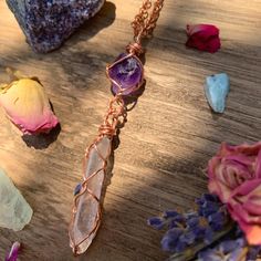 "☾ Double Amethyst + Quartz Necklace ☾ High quality, small gemmy Amethyst in its raw form, above a raw clear quartz point, in a secure & subtle setting that highlights the stones These pendants come in pure copper or sterling silver. Choose from an adjustable Faux leather chord (vegan friendly) a matching 18\" copper chain or a matching 18\" sterling silver chain. Faux leather chords are \"vegan friendly\" because they are actually cotton made to look like leather. These chords are also tied Lavender Natural Stones Jewelry Gift, Spiritual Amethyst Jewelry For Gifts, Handmade Spiritual Birthstone Pendant Necklace, Amethyst Amulet Jewelry For Gifts, Amethyst Amulet Jewelry As Gift, Spiritual Crystal Necklaces With Gemstone For Her, Spiritual Crystal Gemstone Necklaces As Gift For Her, Spiritual Gemstone Crystal Necklace For Her, Spiritual Crystal Necklace With Gemstone For Her