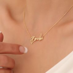 Gold Name Necklace, Personalized Gift, Handmade Jewelry, Dainty Name Necklace, Mother's Day Gift, Christmas gift, Gift For Mom 💕 H O W * TO * O R D E R Step 1 : Choose the color: Gold, Rose Gold, White Gold Step 2 : Choose necklace length: 14" to 24" available Step 3 : Add your personalization: Simply use the 'PERSONALIZATION BOX' to let us know the NAME and FONT NUMBER that you would like. 💕 DETAILS, MATERIAL & FINISH Yellow Gold, Rose Gold, ALL OUR PRODUCTS HAVE 925 SETTING STAMP All of our Name Necklace For Wedding Christmas Gift, Custom Name Necklace For Christmas Wedding, Customized Jewelry For Mother's Day, Customized Jewelry For Mother's Day Gift Making, Customized Jewelry For Mother’s Day Gift Making, Elegant Personalized Jewelry For Gifting, Elegant Necklaces For Mother's Day Gift, Handmade Necklace For Anniversary And Christmas, Personalized Necklaces For Christmas Gift