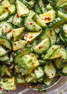 cucumber and pepper salad in a clear bowl