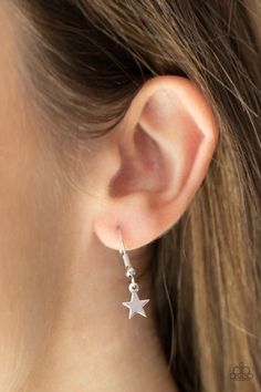 Haphazardly dotted in shiny silver star charms, three dainty silver chains layer below the collar for a stellar look. Features an adjustable clasp closure. Sold as one individual necklace. Includes one pair of matching earrings. #P2WH-SVXX-352XX Silver Star-shaped Dainty Jewelry, Adjustable Star Earrings For Pierced Ears, Adjustable Dangle Jewelry With Star Charm, Adjustable Dangle Star Charm Jewelry, Silver Star-shaped Jewelry With Adjustable Chain, Silver Star-shaped Jewelry With Dangling Charms, Dainty Star-shaped Jewelry With Dangling Charms, Dainty Star-shaped Metal Jewelry, White Star-shaped Jewelry With Adjustable Chain