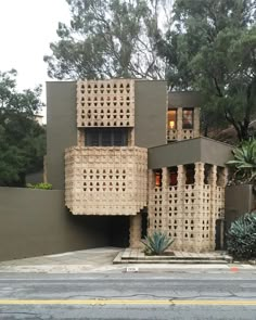 an unusual house made out of woven materials