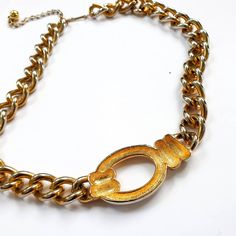 "A beautiful gold chain choker , Great Gift Idea Condition: Great vintage condition Measurements: total Length : 19.7\" / 50 cm We Offer: * Worldwide Shipping * Free Tracking Number * Free Gift Wrapping * Helpful Customer Service ---------------- * ALL ITEMS https://www.etsy.com/shop/VintageNr5 * Every garment we sell is authentic vintage and one-of-a-kind! You will receive the exact item photographed. * For sales and promotions, follow us @vintagenr5 * Subscribe email list and be the first to k Vintage Gold Chain Necklace For Gift, Vintage Gold Necklace With Adjustable Chain, Retro Gold Jewelry With Adjustable Chain, Vintage Gold Plated Necklace With Adjustable Chain, Retro Gold Necklace As A Gift, Retro Gold Necklace For Gift, Vintage Gold Metal Chain Necklace, Vintage Style Chunky Chain Necklace As Gift, Retro Gold Necklace With Adjustable Chain