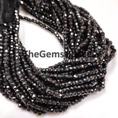 the beads are black and white with silver dots