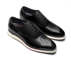 These executive-style slip-on dress shoes are crafted from cow leather with a pigskin lining, offering a blend of sophistication and ease for the modern professional. Formal Calf Leather Slip-ons With Contrast Sole, Modern Business Slip-ons With Contrast Sole, Black Wingtip Lace-up Shoes For Formal Occasions, Classic Black Slip-ons With Brogue Detailing, Business Leather Slip-on Shoes With Rubber Sole, Luxury Black Slip-on Oxfords, Luxury Slip-on Leather Shoes For Business, Modern Formal Slip-ons With Almond Toe, Sleek Black Slip-ons With Rubber Sole