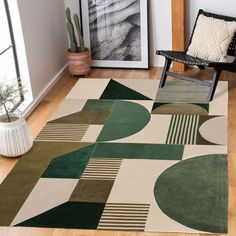 a living room area with a chair and rug