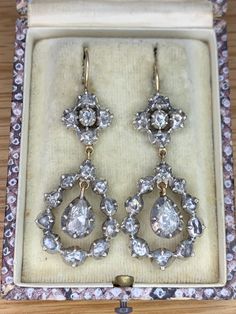 The earrings measure 40mm by 20mm. The total weight of the rose cut diamond is approxinlay 4ct. The front of the earrings is silver and the back test as 15ct yellow gold as do the hook fittings. The earrings are in very good condition with no visible damage and look very nice when worn. Georgian Engagement Ring, 1800s Jewelry, Rose Cut Diamond Pendant, Georgian Jewelry, Rosecut Diamond Ring, Pearl And Diamond Ring, Engagement Ring Diamond Cut, Jewelry Lookbook, Enamel Ring