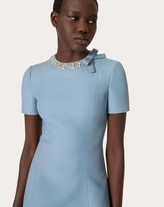 Embroidered Crepe Couture short dress - Bow detail - Rear zip closure - Crepe Couture (65% Virgin Wool, 35% Silk) - Georgette Stretch lining (91% Viscose; 9% Elastane) - Length: 87 cm / 34.3 in. from shoulders in an Italian size 40 - Sleeve length: 39.5 cm / 15.6 in. from the centre back in an Italian size 40 - The model is 176 cm / 5'9" tall and wears an Italian size 40 - Made in Italy The look of the model is completed by a Valentino Garavani Rockstud Spike Bag and Valentino Garavani VLog Valentino Outfits Women, Valentino Mini Dress, Couture Short Dress, Spike Bag, Casual Formal Dresses, Formal Tops, Valentino Dress, Corporate Wear, Dress Bow