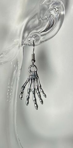 Handmade Silver Skeleton Hand Drop Earrings. They are the perfect Halloween accessory. Chandler Az, Skeleton Hand, Skeleton Hands, Oct 1, Halloween Accessories, Silver Drop Earrings, Handmade Silver, Skeleton, Jewelry Earrings Dangle