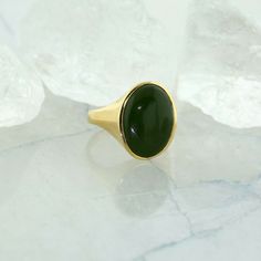 14K Yellow Gold and Jade Ring, oval green jade center, Ring size 6, 7.6 grams Stock # R00868AR Most rings are sizable for a small fee. If the ring you are considering is the incorrect size contact us for a quote. This listing contains photographs of the actual item you will receive. Our items are in excellent condition with little or no signs of wear and many are one of a kind pre-owned estate finds. Please look closely at the pictures in this listing as they are part of the product description. Jade Ring, Ring Oval, Fine Jewelry Designers, Green Jade, Emerald Diamond, Jade Green, Pink Tourmaline, Diamond Ring, Jade