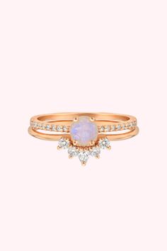 Searching for stacking rings? Discover our Rose Gold Rainbow Moonstone & Topaz Dancing Fairy Ring set at La Kaiser. Crafted with 14kt rose gold, natural white topaz, and vibrant rainbow moonstones, this 3-ring set is ideal for gemstone lover. Add a colorful touch to your everyday style with this unique jewelry piece. Shop now! Celestial Rose Gold Crystal Promise Ring, Rose Gold Moonstone Ring With Rose Cut Diamonds, Rose Gold Moonstone Ring With Gemstone, Rose Gold Stackable Moonstone Ring For Anniversary, Stackable Rose Gold Moonstone Ring For Anniversary, Dainty Rose Gold Moonstone Ring, Rose Gold Celestial Moonstone Ring For Anniversary, Celestial Rose Gold Moonstone Ring For Anniversary, Adjustable Rose Gold Moonstone Ring For Wedding