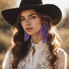 Elevate your style with these exquisite Triple Layered Leather Earrings! Crafted using lightweight and soft leather that are adorned with orange colored multifaceted crystal beads that shimmer in the sunlight. The leather is sourced from an indigenous family-owned business called Tribal Spirit in Canada that creates beautiful deer hides and adds a touch of authenticity and heritage to each pair of earrings.  Elevate your jewelry collection with these handcrafted treasures! Purple Bohemian Chandelier Earrings For Party, Bohemian Purple Chandelier Earrings For Party, Bohemian Earrings For Evening, Bohemian Evening Earrings, Elegant Purple Earrings For Festival, Bohemian Adjustable Chandelier Earrings For Parties, Adjustable Bohemian Chandelier Earrings For Party, Bohemian Fringe Earrings For Evening, Elegant Feather Earrings For Festival