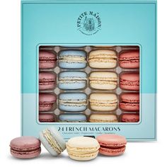 french macaroons in a blue box on a white background with an image of the macaroons