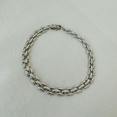 Classic White Gold Chunky Chain Bracelet, Classic White Gold Bracelets With Chunky Chain, Classic White Gold Bracelet With Chunky Chain, Modern Chunky Chain Bracelet For Everyday, Modern Chunky Chain Link Bracelet, Timeless Metal Chain Bracelet, Modern Link Chain Bracelet With Chunky Chain, Timeless Metal Bracelets With Rectangular Links, Timeless Metal Bracelet With Rectangular Links