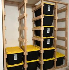 the shelves are filled with black and yellow containers