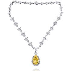 Platinum Yellow Diamond Necklace: GIA certified center stones 35.31cts fancy intense VS2 yellow pear shape 47cts round, marquee, pear shaped diamonds D/E/F VVs-VS 1.5cts pear shaped diamond center stone E VS1 Length: 20" Yellow Stone Necklace, Elegant Yellow Diamond Necklace, Fancy Yellow Diamond Necklace, Luxury Yellow Diamond Necklace, Big Diamonds Necklace, Luxury Yellow Pear-shaped Necklace, Pear-shaped Yellow Jewelry With Diamond Accents, Yellow Diamond Jewelry, Yellow Diamond Necklace