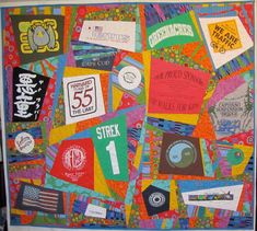 a colorful quilt with various stickers on it