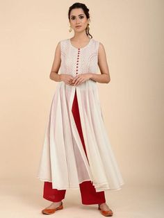 Ivory Red Sleeveless Umbrella Kurta By Sonal Kabra now available at Trendroots Sleeveless Cutdana Dress For Navratri, Sleeveless Dress With Cutdana For Navratri, Sleeveless Cutdana Kurta For Navratri, Sleeveless Kurta With Cutdana For Navratri, Sleeveless Chikankari Chanderi Dress, Sleeveless Chanderi Dress With Chikankari Embroidery, Elegant Sleeveless Summer Kurta, Summer Cutdana Chanderi Dress, Off White Chanderi Straight Kurta Dress