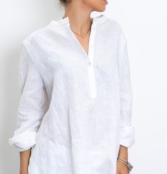 The White linen blouse women is our favorite weekender. Featuring an oversized relaxed fit with front button closing and long sleeves. The long sleeve shirt is made from lightweight linen, that is versatile for any occasion! The White linen blouse women is designed to be comfortable and not troublesome to wear. After wearing this White long sleeve linen shirt women, you will love it even more. ▸FABRIC The white linen blouse women is made from high quality 100% linen ▸SIZING This model linen shir White Long Linen Shirt, Luxury Long Sleeve Linen Top, Oversized White Shirt Plus Size, Woman Extra Long Shirt, Cheap Festive White Shirt, Linen Shirts Women Professional, Luxury Elegant Linen Shirt, Women Oversized Shirt, Oversized Shirt Women